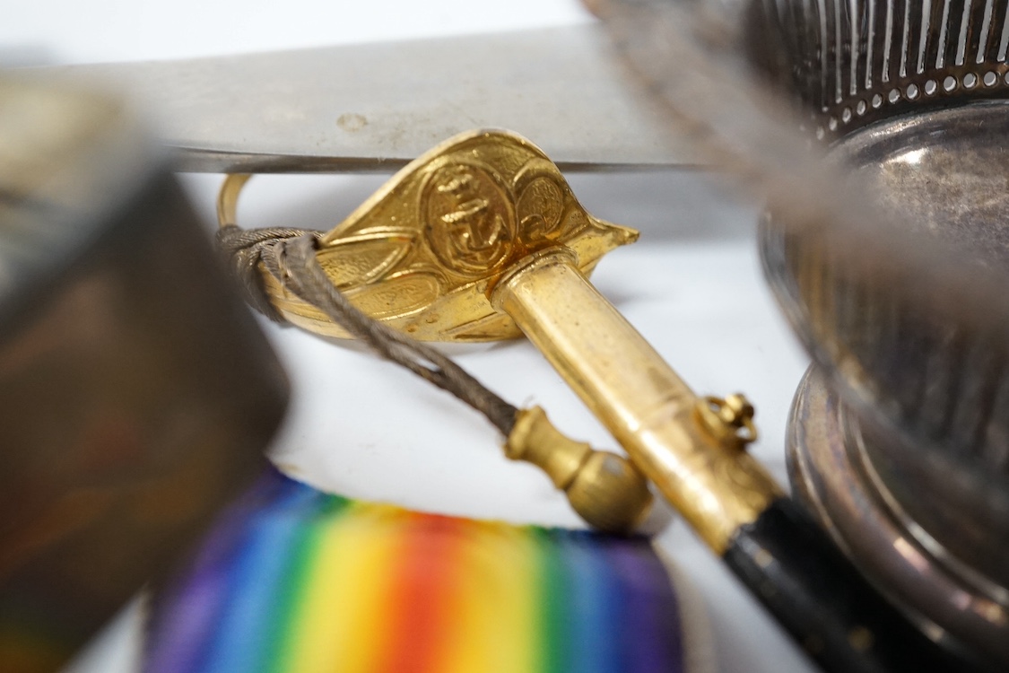 A First World War medal trio awarded to Lieut. W. Cleveland-Stevens. R.N.V.R., together with a miniature on ivory of a 19th century Captain with description to reverse, a signed military coloured engraving, a paper knife